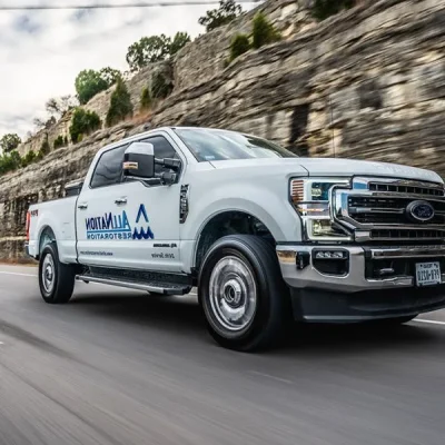 All-Nation-Restoration-truck-driving-on-the-road-600x600.jpg